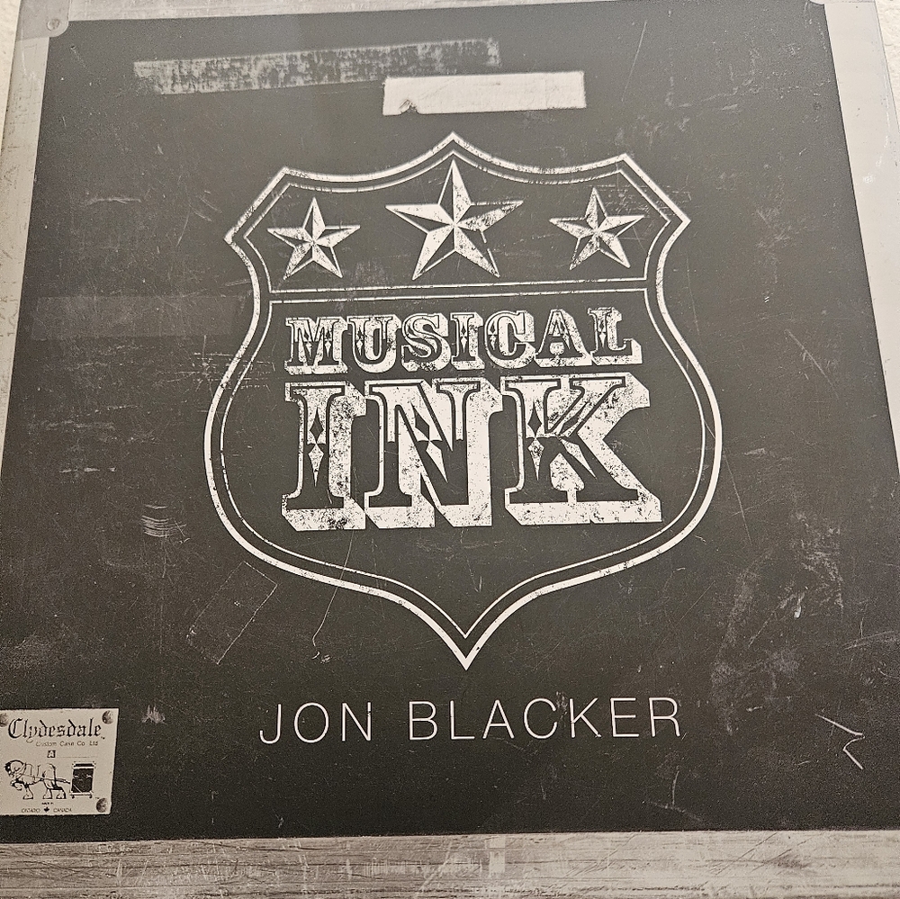 New Musical Ink Hard Cover Book with Dust Jacket.